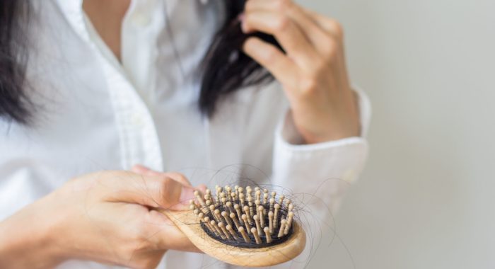 Closeup,Of,Comb,Brush,With,Long,Loss,Hair,With,Copy